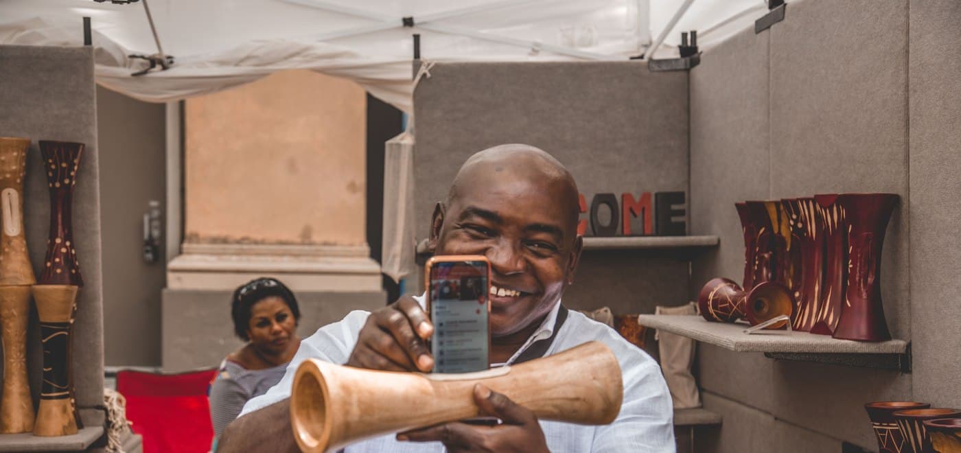 Business owner using mobile payments